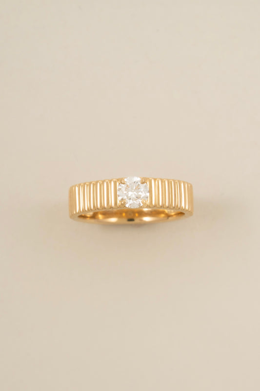 14k solid gold ribbed stacking ring with a round lab-grown diamond