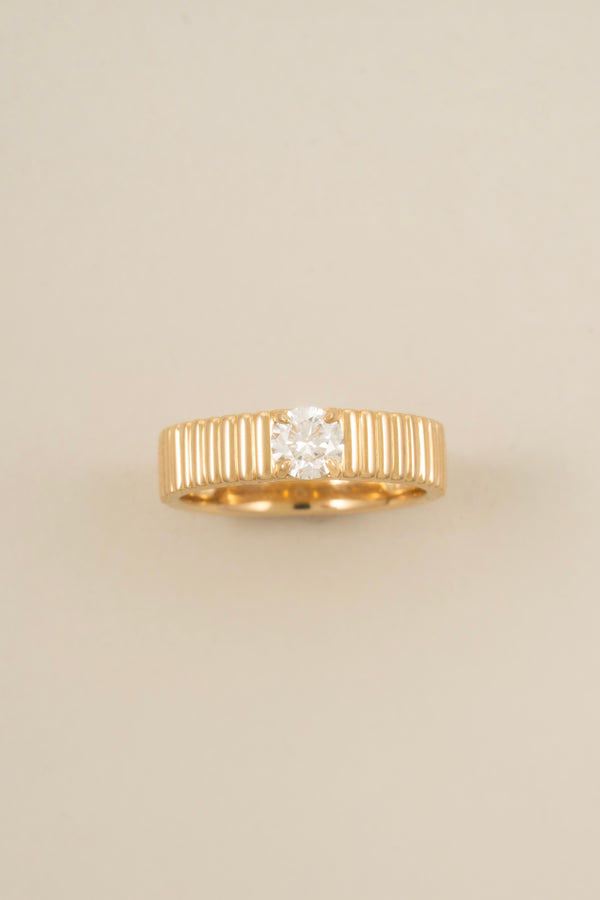 14k solid gold ribbed stacking ring with a round lab-grown diamond